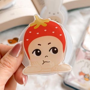 May include: A rustic wooden sign with the text "Welcome to our home" in white lettering. The sign features a distressed finish and a simple, inviting design, perfect for entryway decor.