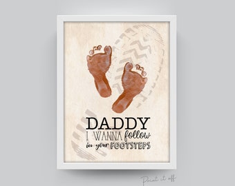 May include: A printable art print with a brown footprint design and the text "Daddy I wanna follow in your footsteps".