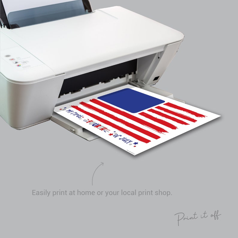 May include: A printable 4th of July design featuring a red, white, and blue American flag with the text "Happy 4th of July" and "We the People" printed on it. The design is being printed on a white printer.