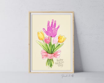 May include: A printable Mother's Day card featuring a pink handprint in the shape of a tulip flower with a bouquet of yellow and pink tulips. The card reads "Happy Mother's Day".