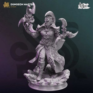 May include: A grey, detailed miniature figurine of a fantasy elf warrior holding two crescent-shaped blades. The elf is wearing ornate armour and a flowing robe. The figurine is standing on a rocky base.