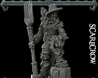 May include: A gray painted miniature figurine of a scarecrow with a straw hat, holding a pitchfork and standing on a base. The figurine is labeled "SCARECROW".