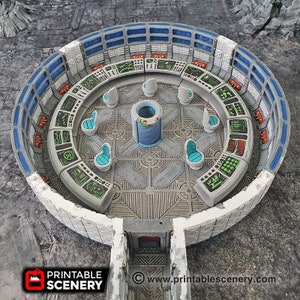 May include: A detailed, gray and blue miniature sci-fi command center with a circular design. The interior features control panels, chairs, and a central column. The model is designed for tabletop gaming and has the text "Printable Scenery".