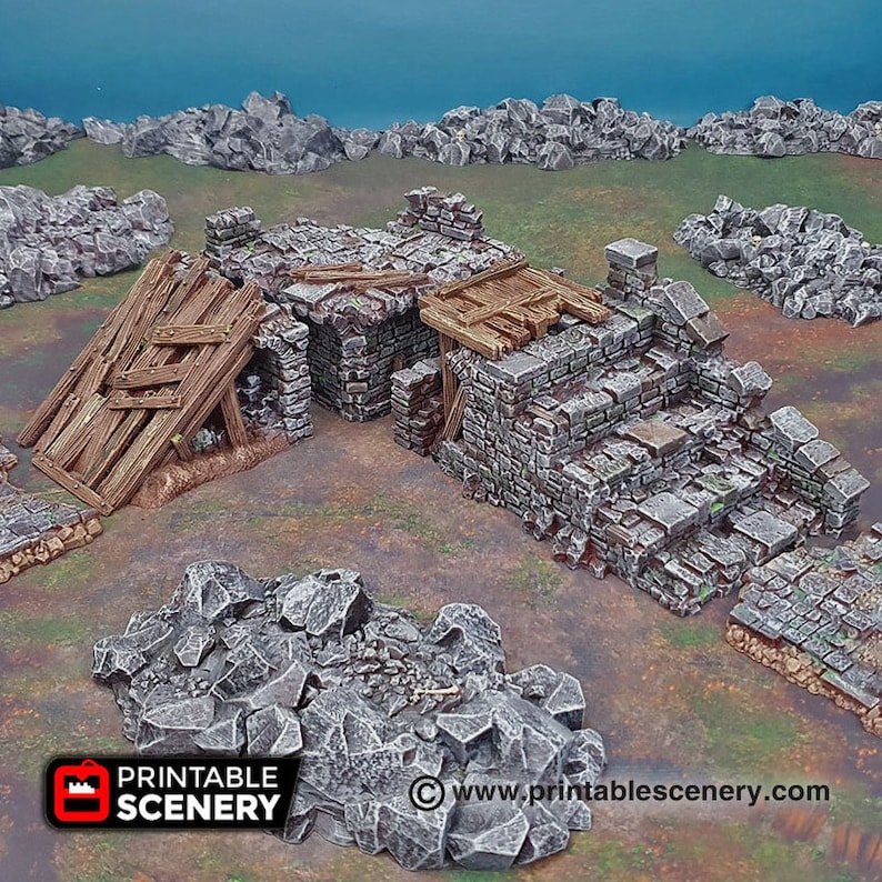 May include: A set of 3D printed, grey and brown, ruined stone building structures with wooden beams and a pile of grey rocks. The structures are designed for tabletop gaming and are part of a collection of printable scenery.