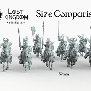 May include: Size comparison of miniature figures. Two figures are 28mm and 32mm tall. The remaining figures are 32mm tall and are mounted on horses. The figures are gray and are posed in a marching formation. The figures are from the Lost Kingdom miniatures line.