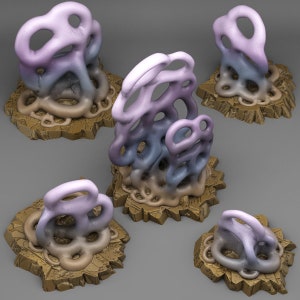 May include: Five decorative ceramic sculptures with a purple, blue, and brown color scheme. Each sculpture is a unique abstract design with a textured surface. The sculptures are arranged on a gray background.