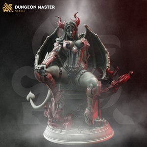 May include: A green-skinned, female demon figurine with horns, wings, and a tail. She is sitting on a stone throne with a red base. The figurine is made of a dark, textured material and has a detailed design.