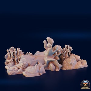 May include: A 3D printed miniature terrain piece depicting a rocky outcropping with a large, organic, coral-like formation. The piece is painted in a light brown color and is designed for use in tabletop games.