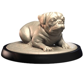 May include: A detailed sculpture of a pug dog in a resting pose. The dog is light gray and sits on a textured, circular base with a black border. The pug's features are well-defined, with visible wrinkles and a gentle expression.