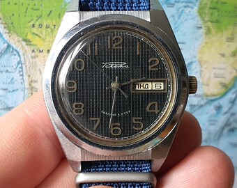 montre-bracelet soviétique vintage pour hommes RAKETA ROCKET URSS années 1970 avec calendrier original