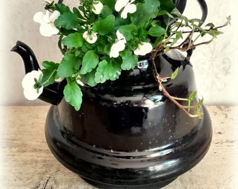 Old black large enamel kettle