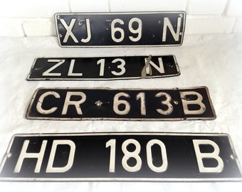4 old original license plates with great patina industrial wall decoration