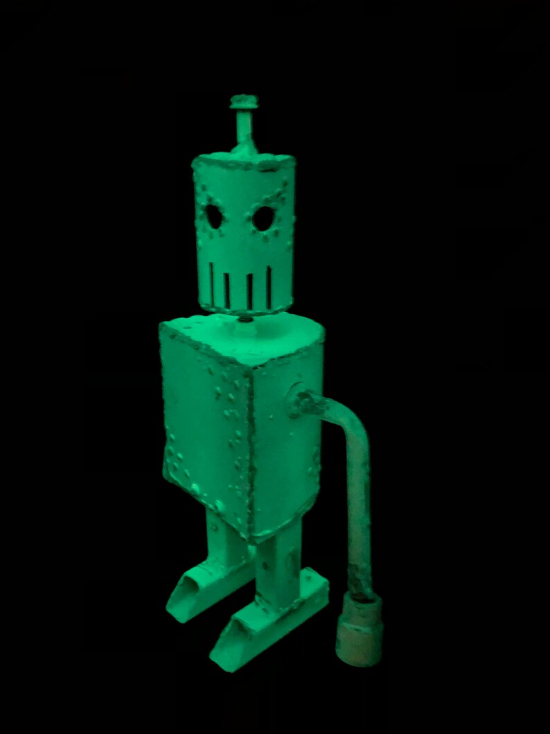 Robot Army Z 130, A White Metal Robot Zombie Sculpture, With Rotating Features, and Glow in the