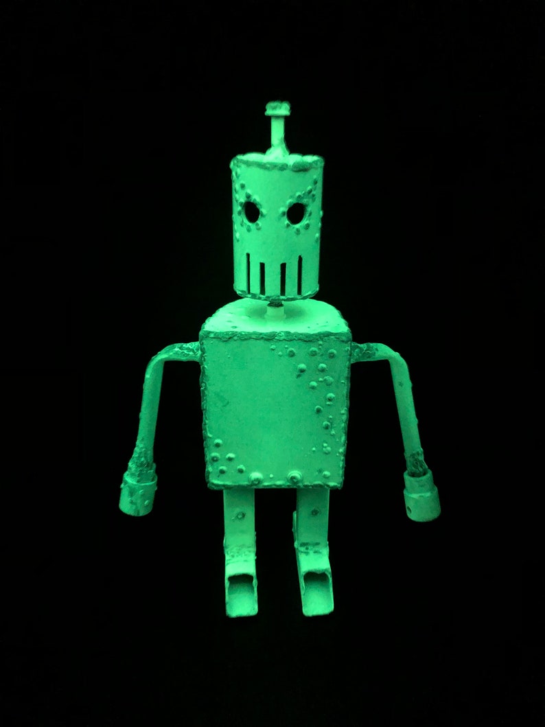 Robot Army Z 130, A White Metal Robot Zombie Sculpture, With Rotating Features, and Glow in the