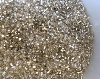 Vintage 11/0 or 2mm silver lined seed beads