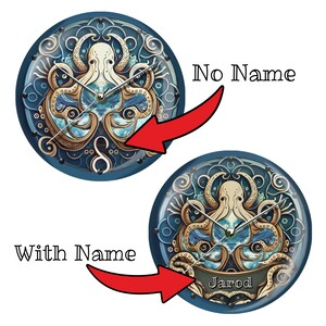 May include: Round wall clock featuring an octopus design in shades of blue, beige, and gold. The clock face has an intricate, artistic design with a nautical theme. The clock is available with or without a name.