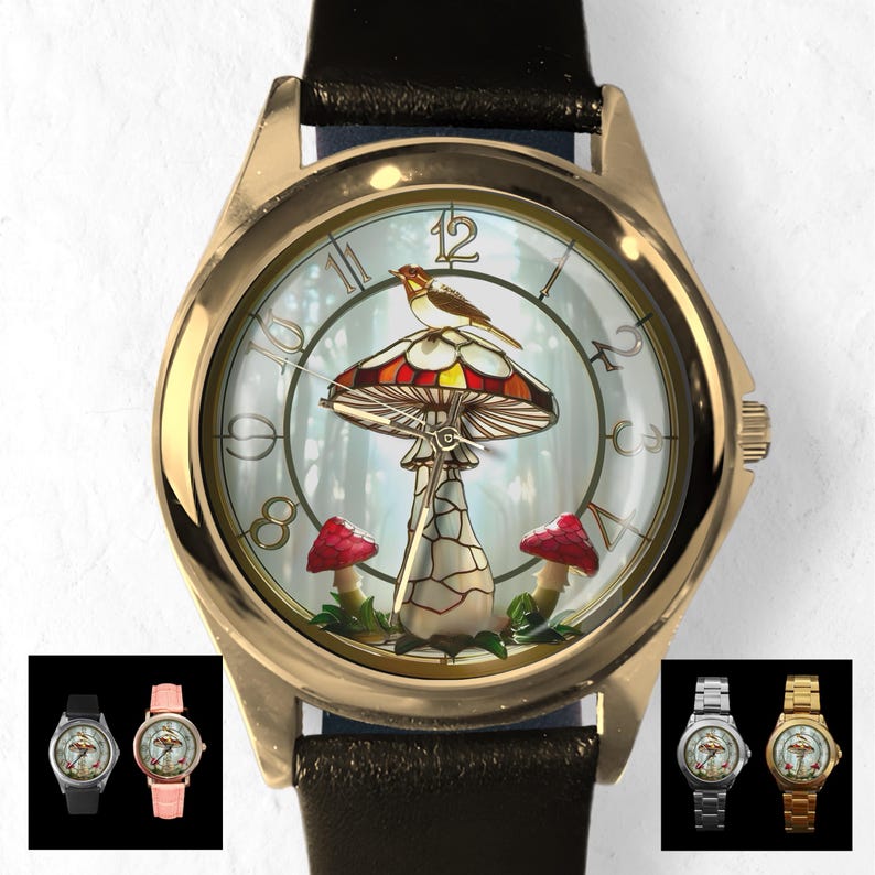 Puede incluir: Un reloj de pulsera dorado con una correa de cuero negro. La esfera del reloj presenta un dise&ntilde;o de hongo con un p&aacute;jaro posado encima. Dos hongos rojos est&aacute;n en la parte inferior. Se muestran estilos de reloj adicionales.