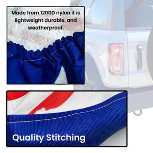 May include: Close-up of a blue and red tire cover with white stitching. The cover is made of 1200D nylon and is lightweight, durable, and weatherproof. The text "Made from 1200D nylon it is lightweight durable, and weatherproof." is visible in the image. The text "Quality Stitching" is visible in the image.