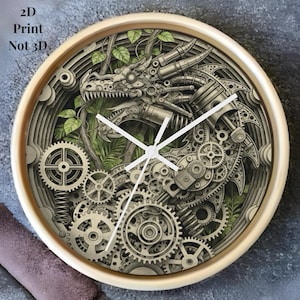 May include: Circular wall clock featuring a steampunk dragon design. The clock face showcases a detailed illustration of a dragon made from gears and mechanical components, with green foliage. The text "2D Print Not 3D" is visible.