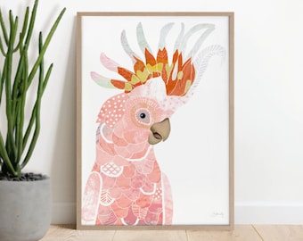 May include: A framed art print featuring a pink and orange cockatoo illustration. The bird has a detailed design with patterns and textures, set against a white background. The artwork is in a wooden frame, with a potted plant in the background.
