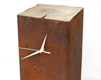 Rusty metal clock. Rough table clock.