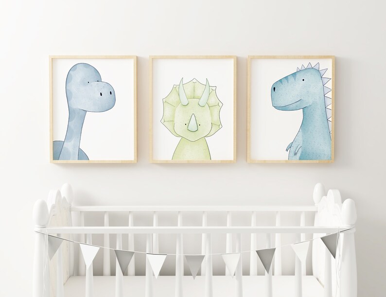 May include: Three framed watercolor illustrations of dinosaurs. The first shows a blue dinosaur with a long neck, the second shows a green dinosaur with three horns, and the third shows a blue dinosaur with spikes on its back.