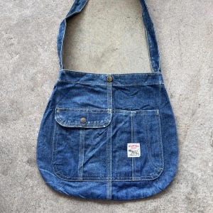 Bolso bandolera Pointer Blue Denim, estilo retro, con múltiples bolsillos.