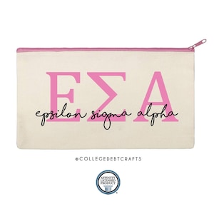 May include: A canvas zipper pouch with a pink zipper and the Greek letters EΣA in pink. Below the letters is the cursive text "epsilon sigma alpha". The text "COLLEGEDEBTCRAFTS" is below the pouch.