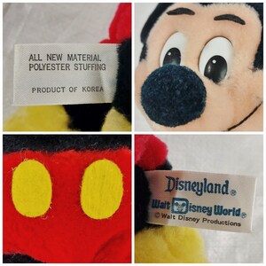 May include: A red and black plush Mickey Mouse toy with yellow buttons. The toy has a tag that reads "Disneyland. Walt Disney World. Walt Disney Productions".