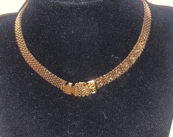 Vintage gold chain belt choker just under 15 inches long. Designed to look like a wide vintage belt with 8 holes and two belt loops.