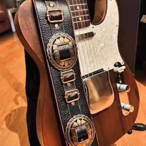 Leather guitar strap with silver conchos. Handmade.