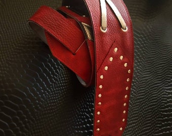 Guitar strap with studs