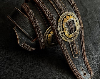 Black reptile guitar strap with conchos