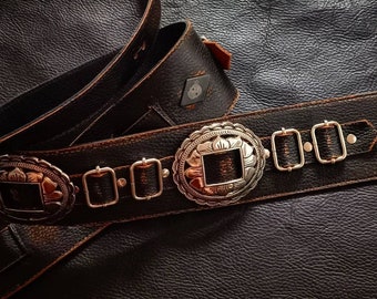 Leather guitar strap with silver conchos