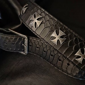 Black leather guitar strap with crosses