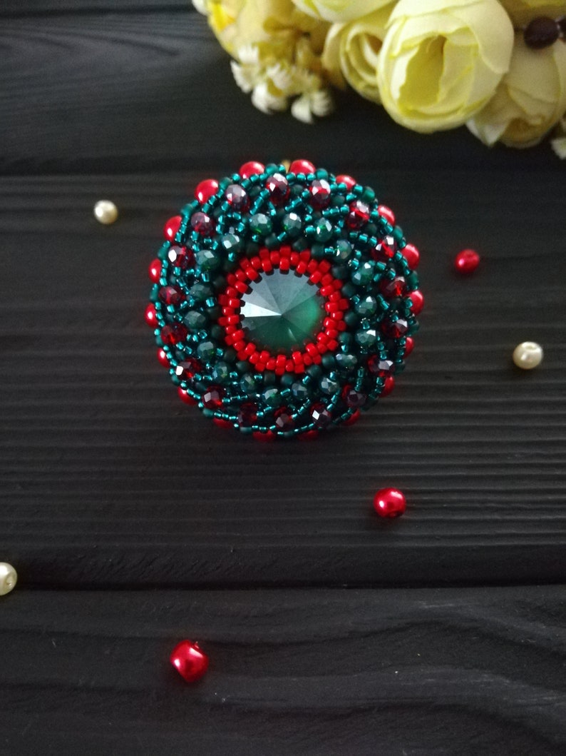 Green round bead brooch