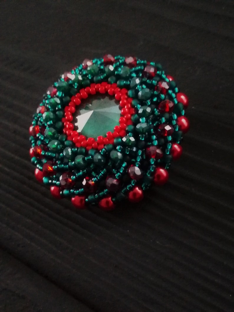 Green round bead brooch