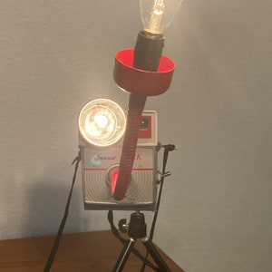 Repurposed vintage camera lamp