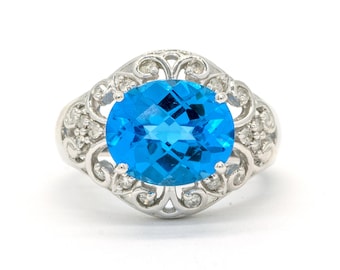 White Gold 6.25CTW Faceted Top Oval Cut Prong Set Natural Blue Topaz and Diamond Ring