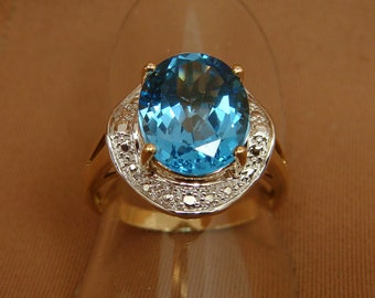 Large 4 ct Oval BLUE TOPAZ Ring 10K Yellow Gold  - Size 7.25