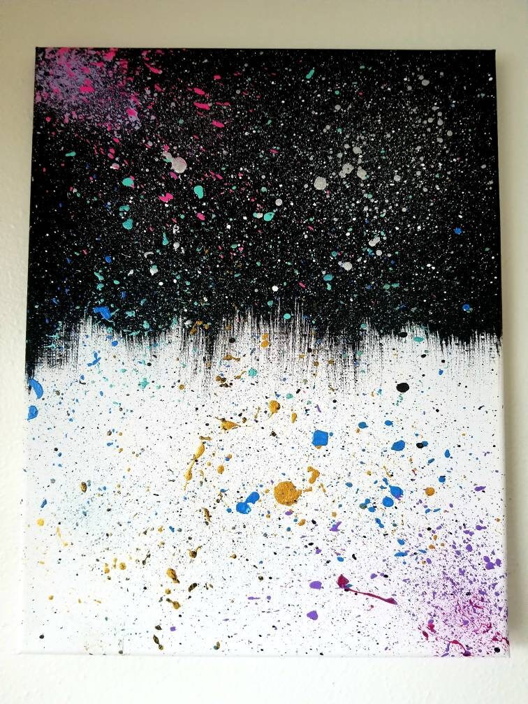 light on dark splatter paint wall art