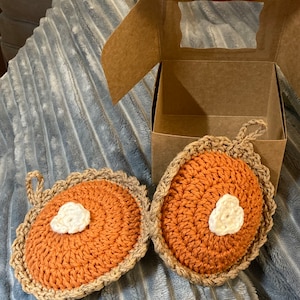 Two pumpkin pie ornaments