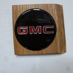 GMC Truck Wheel Insert Emblem Wall Plaque - Unique automotive art with an original vehicle emblem for garage, shop or man cave. #AE-398