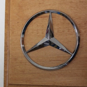 Mercedes Benz Chrome Emblem Wall Plaque - Unique automotive art with an original vehicle emblem for garage, shop or man cave. #AE-379