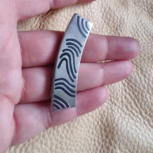 modernist money clip, possibly Niello silver