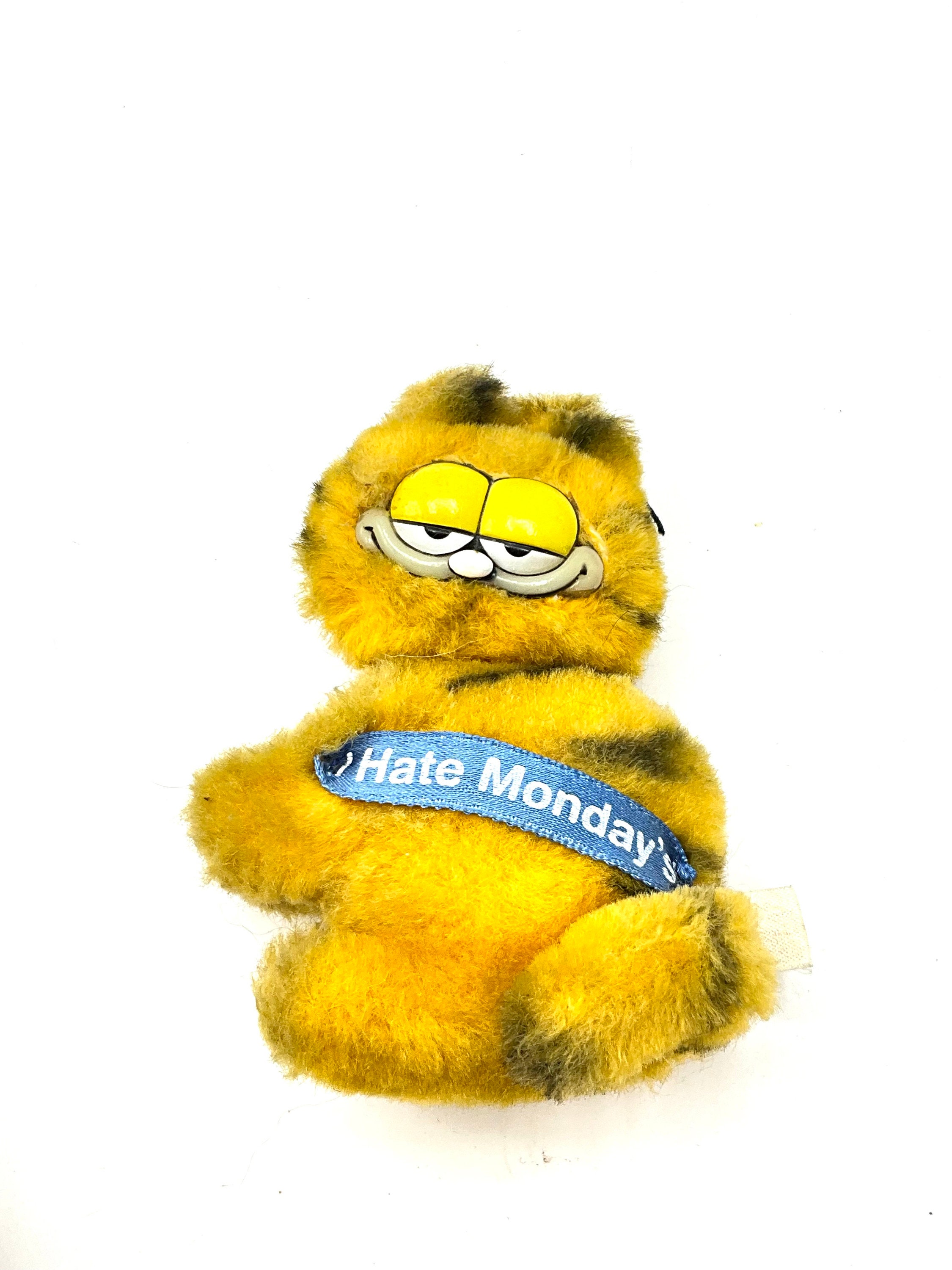 Gorgeous collectible and vintage plush pencil clip Garfield