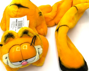 Gorgeous collectible and vintage stuffed Garfield with long tail, orange, cat, door draft dodger, stopper plush long tail, 30 inches.