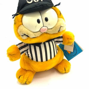 Gorgeous collectible and vintage Garfield stuff animals as a referee, time out, hat. NWT