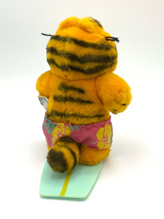 Gorgeous collectible and vintage Hawaiian Garfield with surf board