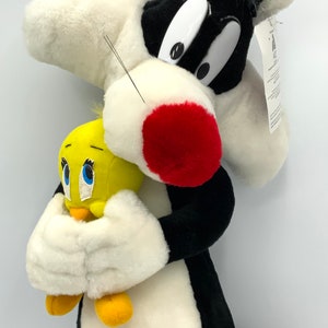 Gorgeous collectible and vintage Sylvester and Tweety stuffed, toy,  Looney Tunes,  push,  cat,  large with the original tag.